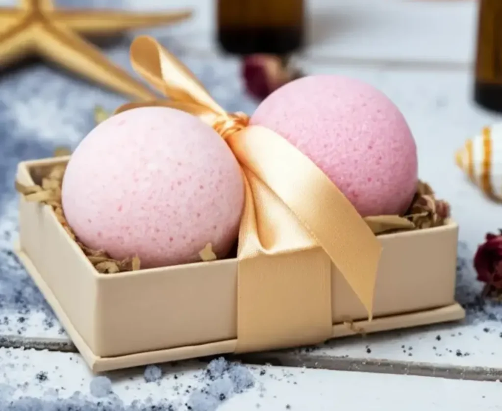 Paper bath salt gift box wrapped with champagne ribbon